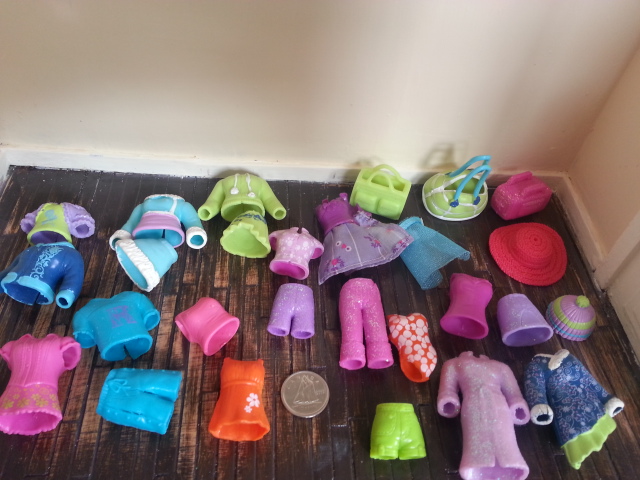 polly pocket dolls with rubber clothes